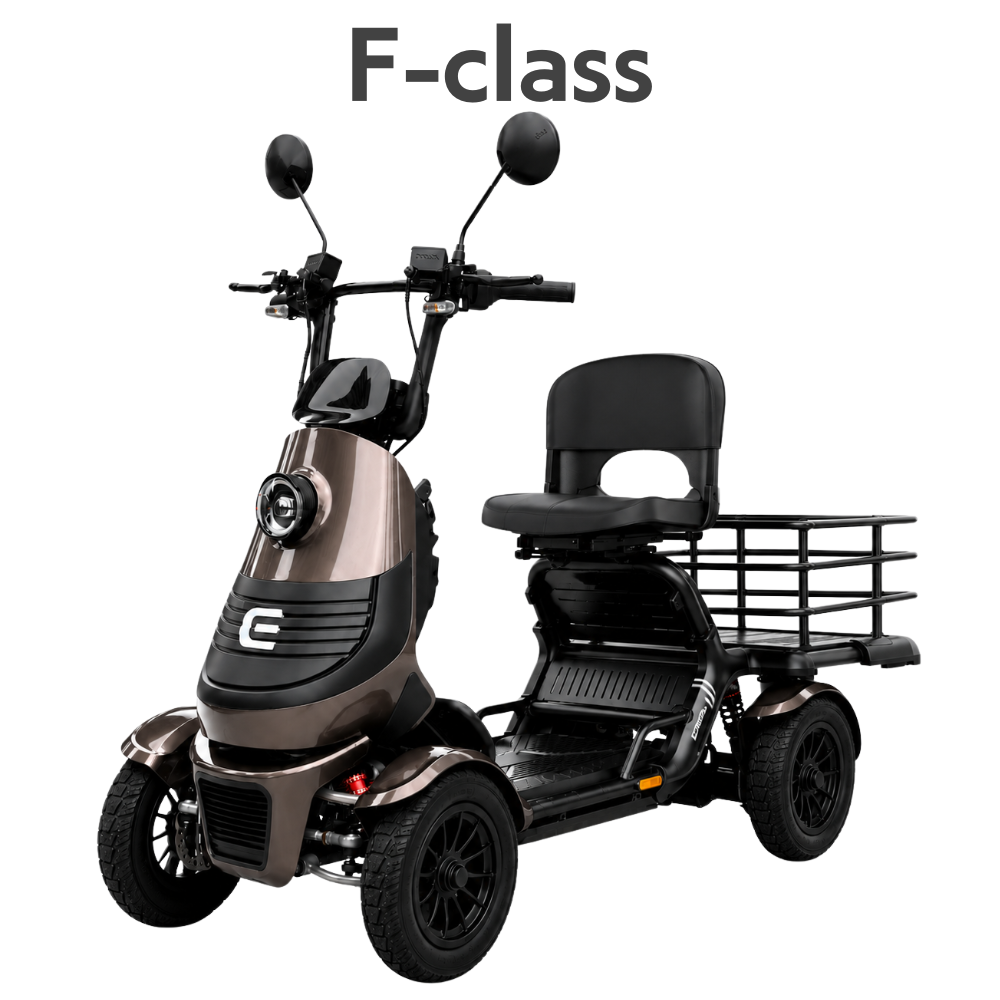 Three-wheeled electric mobility scooter with a padded seat, backrest, and large rear cargo rack labeled 'F-class' at the top (model name).