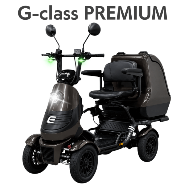 Brown G-class PREMIUM three-wheeled mobility scooter with an enclosed cabin, front headlight on, and armrests.